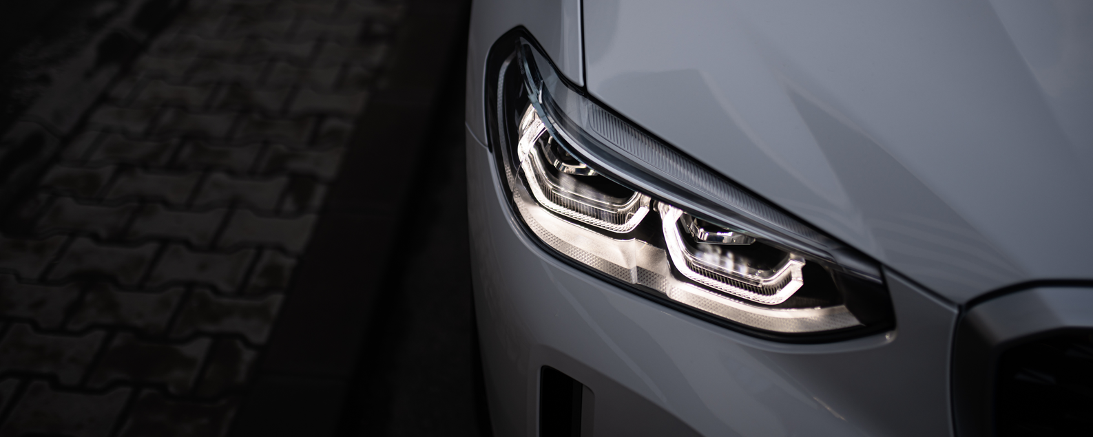 Close up of a white BMW car